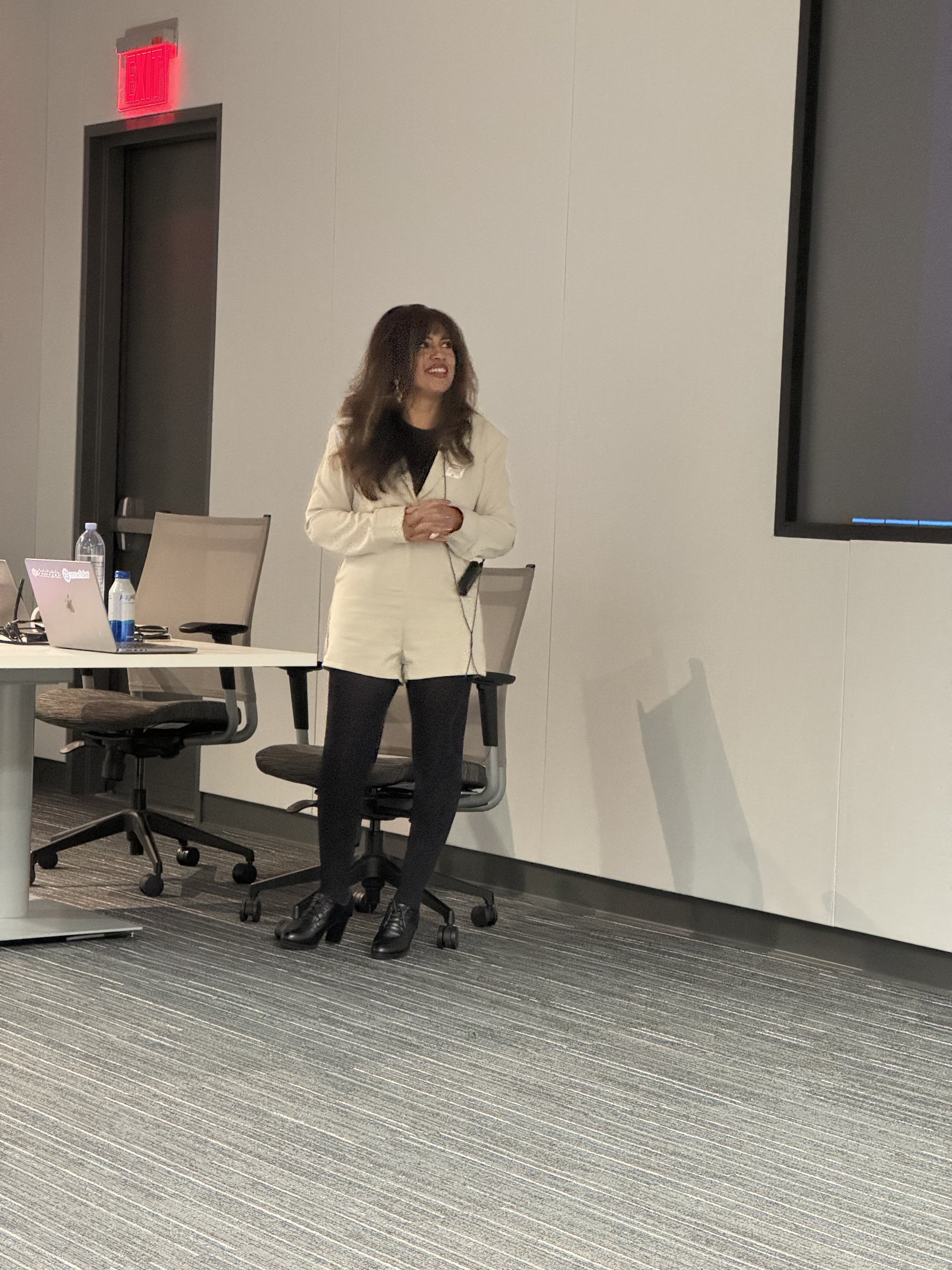 Jothi Moorthy delivering the From Invisible Expert to Industry Voice keynote at GM Women in Data Science, May 13, 2026