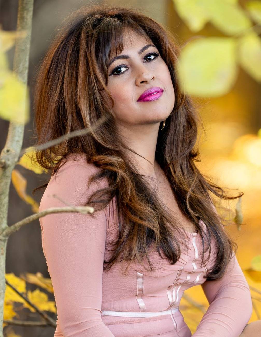 Jothi Moorthy outdoors in a warm, approachable setting